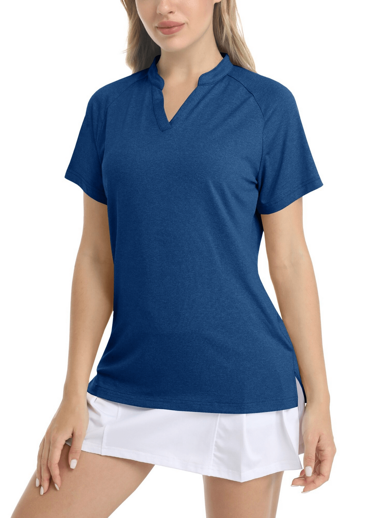 Woman wearing a blue women's sports V-neck T-shirt and white shorts. Lightweight, breathable, perfect for sporty or casual looks.